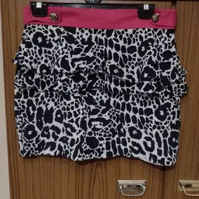 Animal Print Mini Skirt Size 10 . Worn a couple of times but in great condition has  buttons on the 