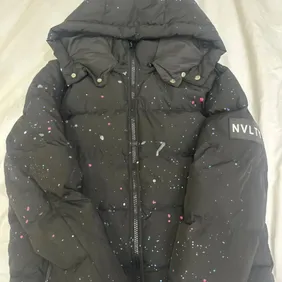 Stylish NVLTY Medium Puffer Jacket - Excellent Condition!Cozy up in this gently used, medium-size NV