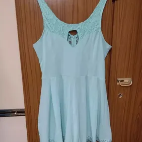 mint green playsuit size l will fit about a 10-12 Mint green playsuit lace on top and on the bottom 