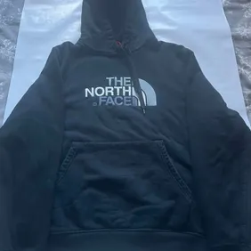 The North Face Medium Hoodie - Cozy & Durable Casual WearSnuggle up in style with this medium-sized 