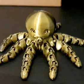 Embrace Elegance with our Black & Gold Octopus Keychain!