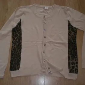 Ladies thin, long sleeve beige cardigan with leopard skin panels on each side and a small heart stit