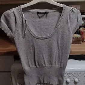 Grey Top Size 8 Never worn has knitted feel deep ribbed bottom