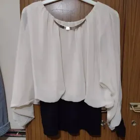 Little mistress chiffon top size 10 Has Jersey feel material on the body has flared sleeves with bla