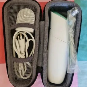 Excellent condition Philips Sonicare AirFloss with a nice Travel case and a UK 3-pin adapter.