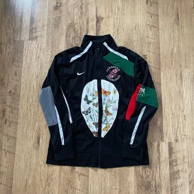 Vintage Nike Reworked Tracksuit Jacket - Unique Style, Size XL rare find! Stand out in this one-of-a