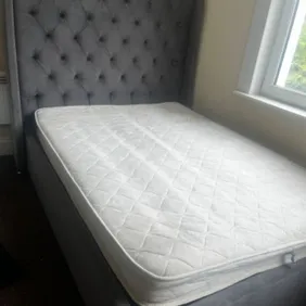 Storage bed with mattress. Minor non visible imperfections. Needs gone today, or not selling. 