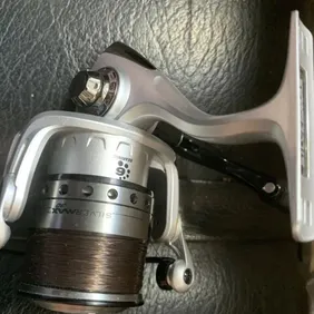 ABU GARCIA SILVER MAX FIXED SPOOL REEL L/H OR R/H WIND 6 BALL BEARINGS AS NEW UNBOXED RETAILS @ AROU
