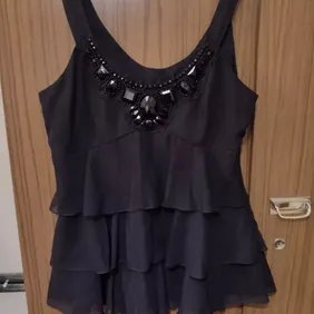 Black layered jewel ruffly top et vous size 12 Black ruffle top gems on the chest has side zip size 