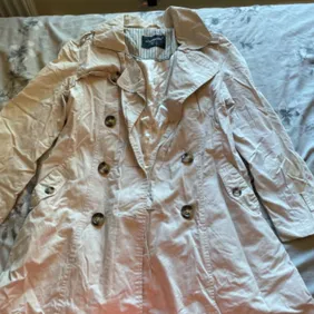 long cream coat, been worn before once 