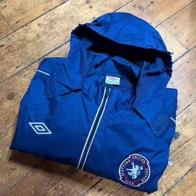 • Brand/Club: Umbro featuring a Scottish United Soccer Club crest.