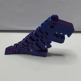 Roar in Style with FLEXI T-Rex Keychain – Blue & Pink!