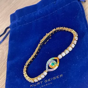 Kurt Geiger Evil Eye Bracelet - Brand New with BagDiscover protection and style with this new Kurt G