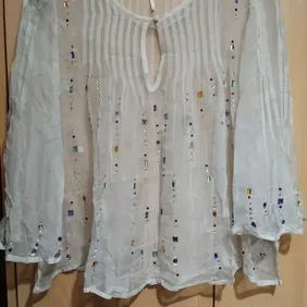 lovely top from free people not been worn unfortunately is to small for my chest looks alot better t