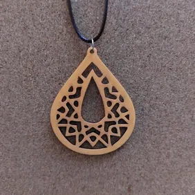 Wooden laser cut pendant in presentation box