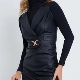 Gorgeous leather look dress worn few times.im 5ft 2 and just comes above my knee .jumper not include