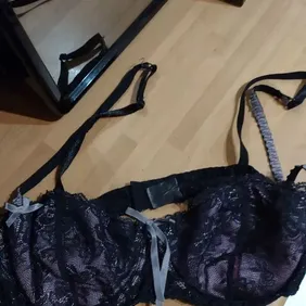 Pink And Black Bra Size 34c . Worn quite a bit but still wearable slight bit of bobbling on the insi