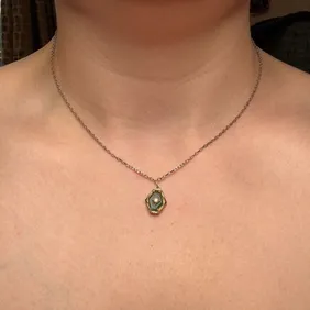 Green agate & white topaz gold tone pendant and sterling silver necklace