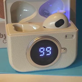 Brand new Q86 wireless earbuds retro design with a nifty digital charging case. Will work on iOS or