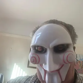 Unveil Your Mysterious Side: 4-Pack White Protestor Masks