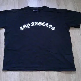 Mens black t-shirt with 'Los Angeles' printed on front. Originally from BooHooMan, size S, 100% cott