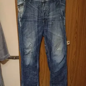 mens diesel jeans really nice jeans they are blue with distressed look worn a few times and has a sl