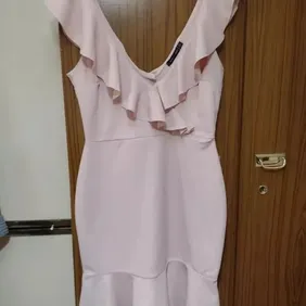 Pink Ruffly Dress Size 12-14 Never worn is more a 12 than 14 lovely dress just don't look right on m