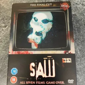 Saw: The Final Cut Collection DVD Box Set (2011) Exclusive Jigsaw Sleeve - VG ConditionOwn the compl