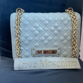 Medium blue quilted moschino bag
