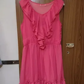 Red frilly dress size 12 to 14 Nice red chiffon dress with red lining label was removed due to irrit