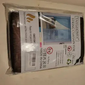 This item is a String Curtain 100% Polyester 90x200cm New as Seen in Pictures