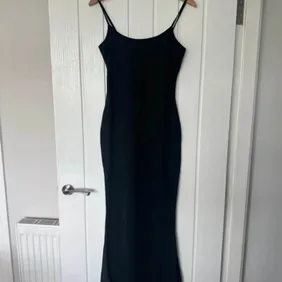 Elegant Black Hourglass Cocktail Dress - New without Tags. Chic and timeless black dress perfect for