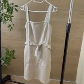 Women's Bershka Small Suede Cream Beige White Casual Dress is a stylish and versatile option for the