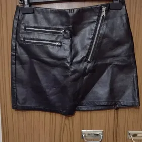 Black Faux Leather Skirt Size 10 From divided H&m never worn 2 zips for show and zip to put on skirt