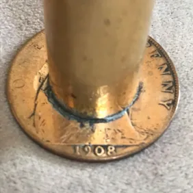 Preserve History with 1908 Brass Trench Art Needle Holder