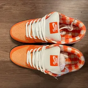 Step Up Your Game: Sleek Orange & White Trainers