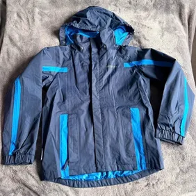 Mountain warehouse rain jacket Worn but in very good condition age13 perfect for school 