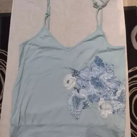 vintage Light Blue Top Pink Soda Size 10 To 12 ties up at the straps and embroidered flower pattern 